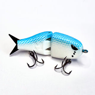 Blue and white Raptor fishing lure on a white background